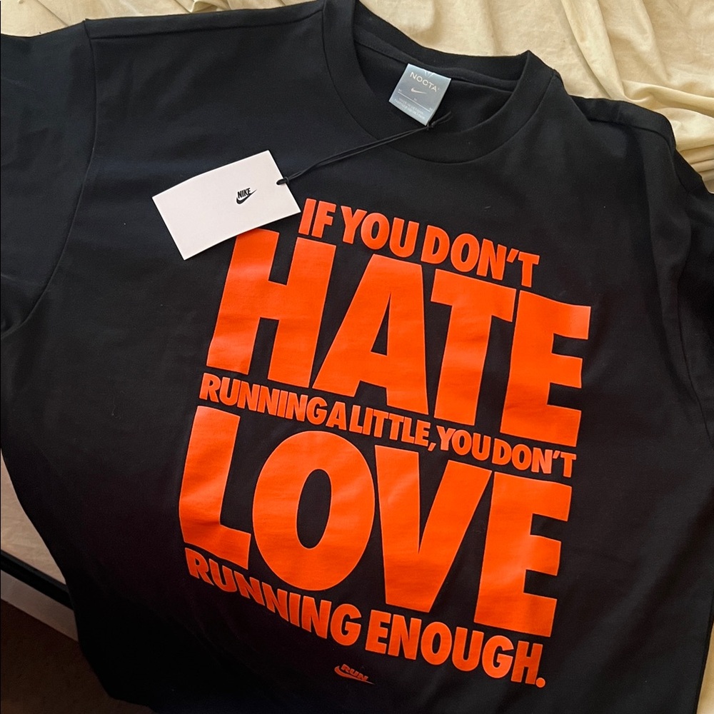 Nike Black Tee with Bold Orange Text